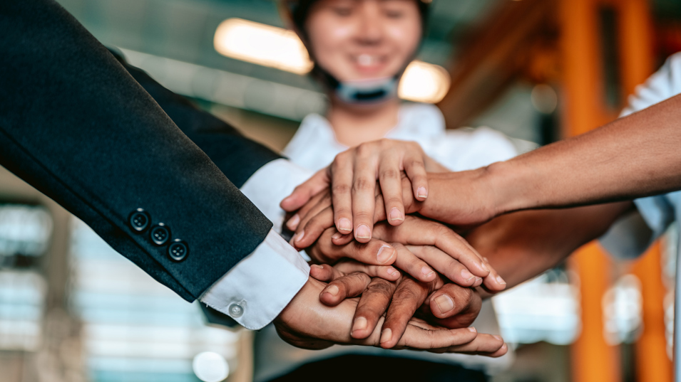 Teamwork på arbejdspladsen.