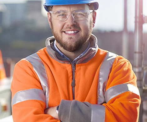 An employee in safety gear.
